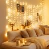 51A5GnoU9NL._AC_.jpg Minetom Curtain Lights, 300 LED Dimmable Fairy Lights with Remote and Timer, 8 Modes, USB Powered String Lights for Room Wall Party Xmas Indoor Decor, Warm White